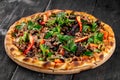 Fresh minced meat pizza with hot pepper and greens Royalty Free Stock Photo