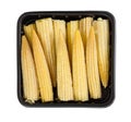 Fresh mini corn in black plastic container