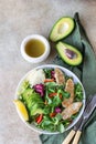 Fresh mix salad with grilled chicken fillet, avocado, apple and bell pepper and olive oil and lemon dressing. Healthy food, diet Royalty Free Stock Photo