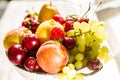 Fresh mixed fruits, berries in bowl. Love fruit, berry. Sunlight Royalty Free Stock Photo