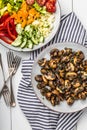 Fresh mixed salat with herbs and mushrooms