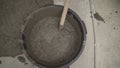 Laying mortar. Mortar in a bucket. fresh mixing of concrete in a bucket at a construction site