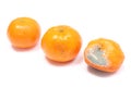 Fresh and moldy mandarins on white background Royalty Free Stock Photo