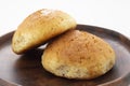 Fresh muffin on a wooden serving board