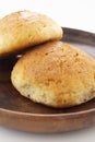 Fresh muffin on a wooden serving board