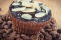 Fresh muffins with chocolate, coffee and dried sliced almonds. Delicious dessert Royalty Free Stock Photo