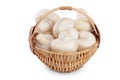 Fresh mushroom champignon in a wicker basket isolated on white background with clipping path Royalty Free Stock Photo