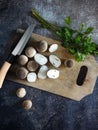 Fresh Mushroom and coriander leaves on cutting board Royalty Free Stock Photo