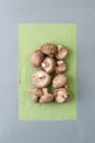 Fresh mushrooms shiitake on an abstract gray-green background