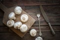 Fresh mushrooms on the wood plate