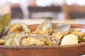 Delicious mussels casserole on wood Royalty Free Stock Photo