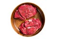 Fresh Mutton chop leg steaks, uncooked lamb meat with herbs. Isolated on white background.