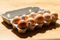 Fresh Natural healthy food and organic farming concept.Chicken eggs in carton box on wooden table.Top view Royalty Free Stock Photo