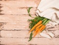 Fresh natural organic carrot bag made of cotton wooden rustic background. Natural organic products. Ecology concept. Royalty Free Stock Photo