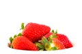 Fresh and natural red strawberries with green leaves isolated and sinking through blending with the plain white background