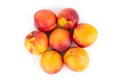 Fresh nectarines fruits isolated on white background. Ripe peach top view Royalty Free Stock Photo