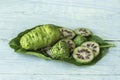 Fresh noni fruit and leaves Royalty Free Stock Photo