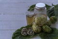 Fresh noni juice for health Royalty Free Stock Photo