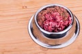 Fresh and nutritious minced raw meat dog food in bowl Royalty Free Stock Photo