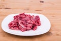 Fresh and nutritious minced raw meat dog food on plate Royalty Free Stock Photo