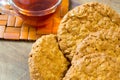 Fresh oatmeal cookies. Delicious and healthy Breakfast. Invigorating hot tea with fresh lemon. Royalty Free Stock Photo