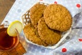 Fresh oatmeal cookies. Delicious and healthy Breakfast. Invigorating hot tea with fresh lemon. Royalty Free Stock Photo