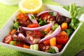 Fresh octopus salad with tomato and onion Royalty Free Stock Photo