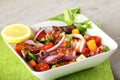 Fresh octopus salad with tomato and onion