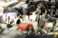 Fresh oil being poured during an oil change to a car Royalty Free Stock Photo