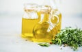 Fresh olive oil bottles with spices and herbs, organic healthy olive oil Royalty Free Stock Photo