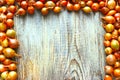 Fresh onions on the light coloured wooden table