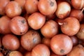 Fresh onions on the market close up photo. Royalty Free Stock Photo