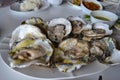 Fresh Open Oysters on white plate