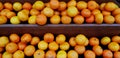 Fresh orange on brown wooden shelf for sale at organic fruit market Royalty Free Stock Photo