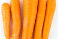 Fresh orange carrot isolated on white background.