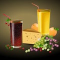 Fresh orange and cherry juice in a glass with fruits