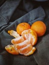 Fresh orange on cloth with available light Royalty Free Stock Photo