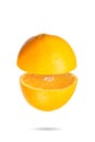 fresh orange cut in half on a white background Royalty Free Stock Photo