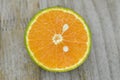 Fresh orange cut half on wooden table, decorate Royalty Free Stock Photo