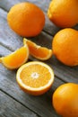 Fresh orange fruit on grey wooden background. Royalty Free Stock Photo