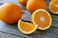 Fresh orange fruit on the grey wooden background Royalty Free Stock Photo