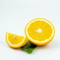 Fresh orange fruit, orange fruit sliced and green leaves on white background Royalty Free Stock Photo