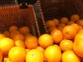 Fresh orange fruit pile on stall in supermarket Royalty Free Stock Photo
