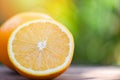 Fresh orange fruit slice half summer nature background Royalty Free Stock Photo