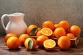 Fresh orange fruits in a box on wooden table Royalty Free Stock Photo