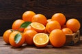 Fresh orange fruits in a box on wooden table Royalty Free Stock Photo