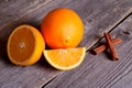 Fresh orange halves on rustic wooden kitchen table Royalty Free Stock Photo