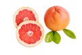 Fresh orange healthy grapefruit whole and sliced with leaves close-up.White background. Royalty Free Stock Photo
