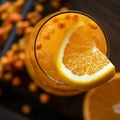 Fresh orange and hippophae juice or soft drink. Sea buckthorn and orange smoothie vitamin cocktail. Bright colors of