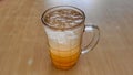 fresh orange juice or es jeruk in a glass. selective focus